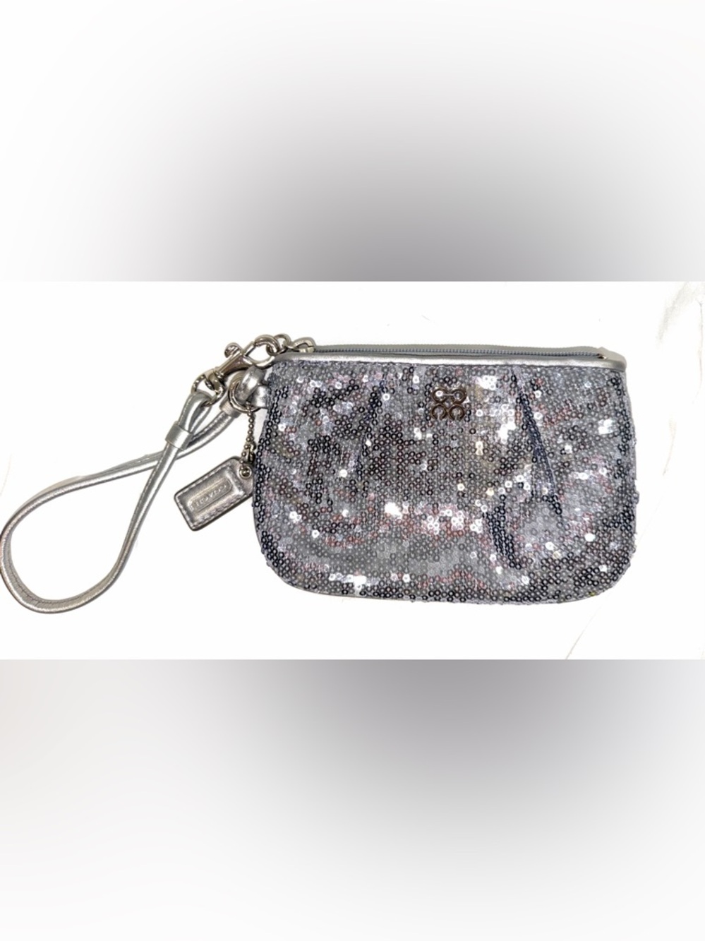 Coach wristlet silver sequins